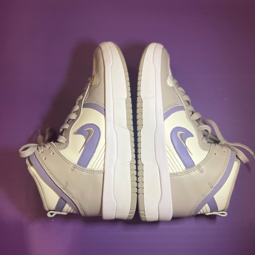 Authentic Nike woman dunk high iron purple sz6. Lightly used.